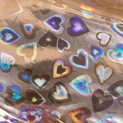 Corazón holográfico lila
